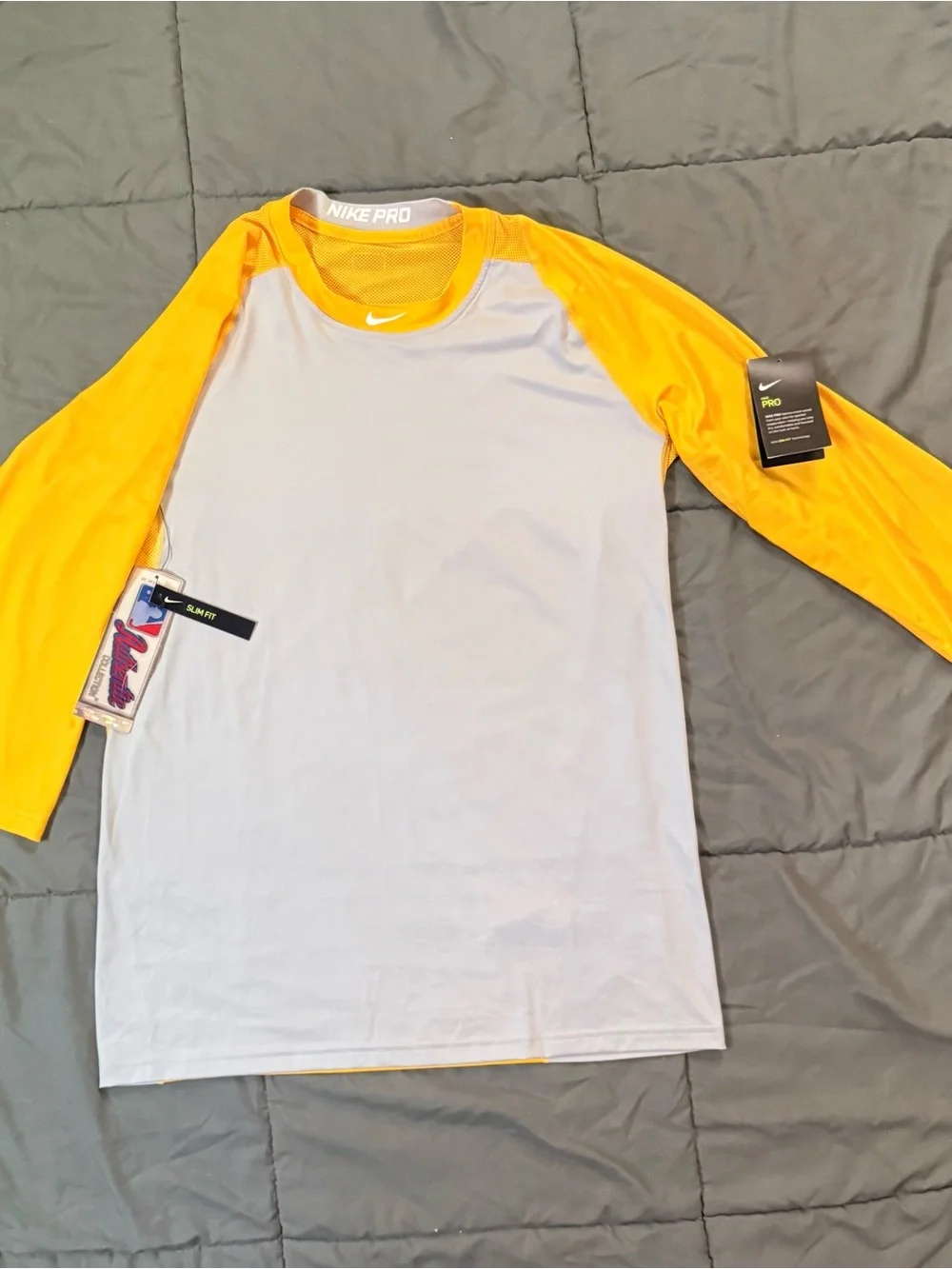 Nike Men’s Long-Sleeve Raglan Performance Shirt in White and Yellow